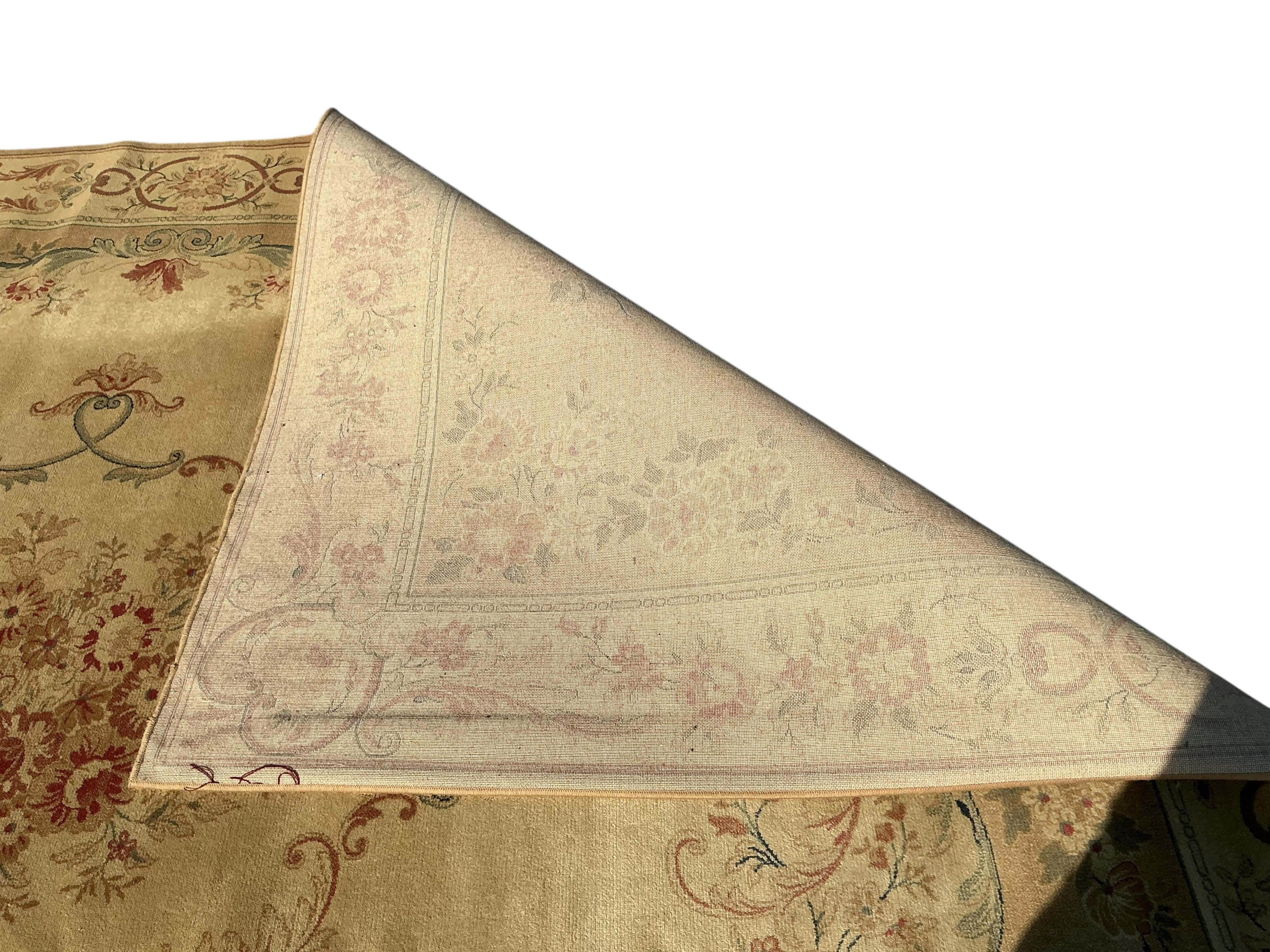 A Belgian Aubusson style wool carpet, 365 x 275cm